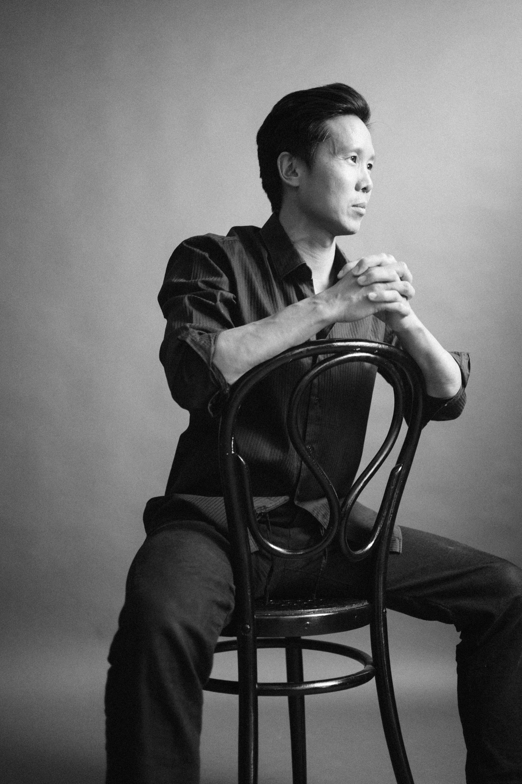 Black and white seated portrait